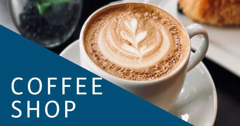 image shows a cup of latte coffee with coffee shop text